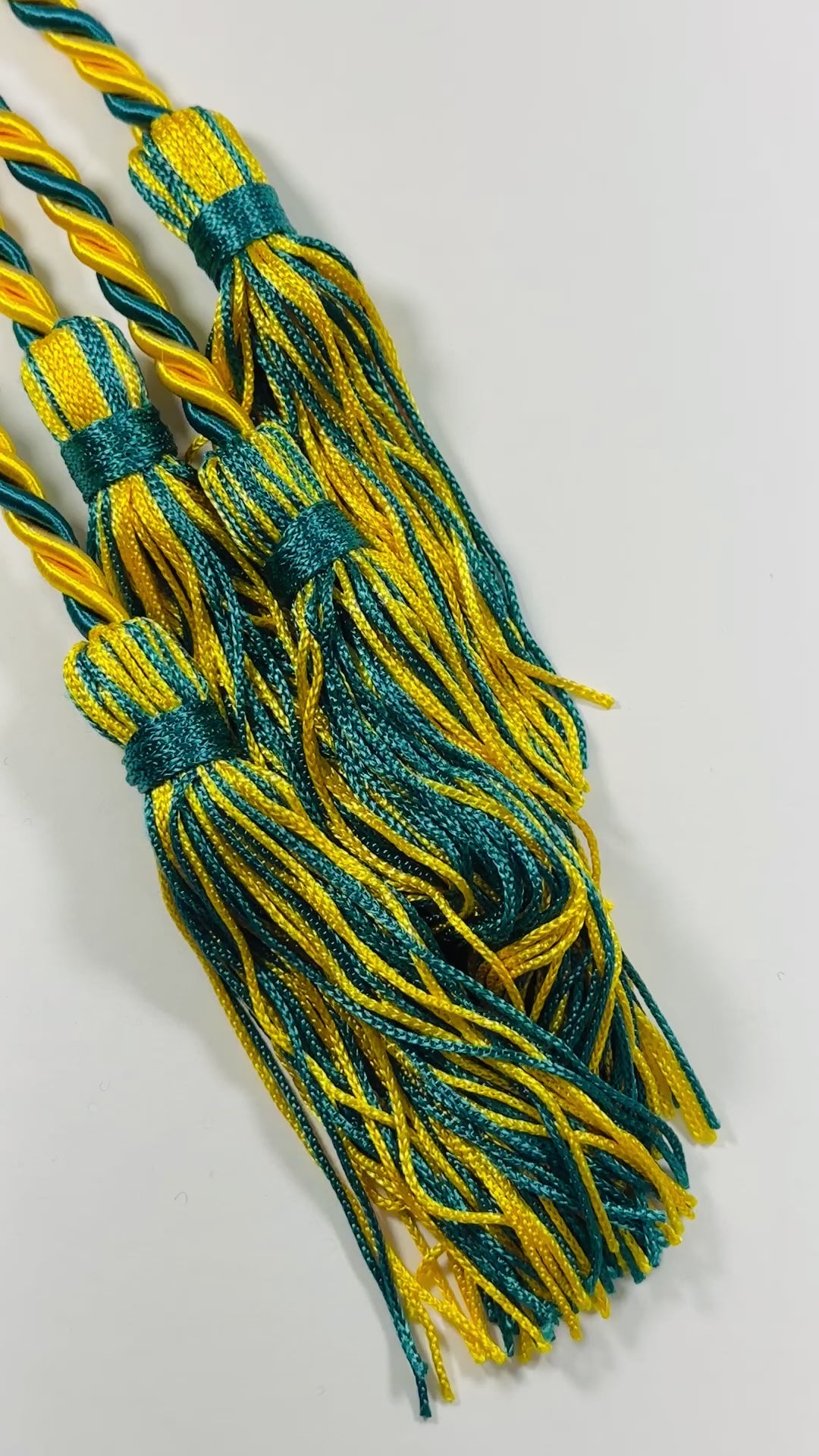 teal and gold graduation honor cords
